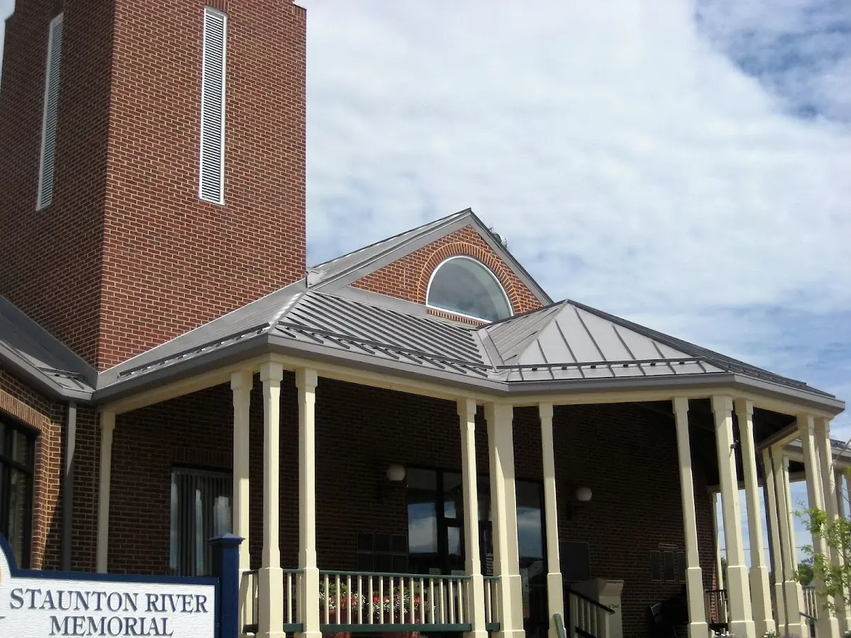 Skilled roofing craftsmen working on a residential roof in West Point Pleasant